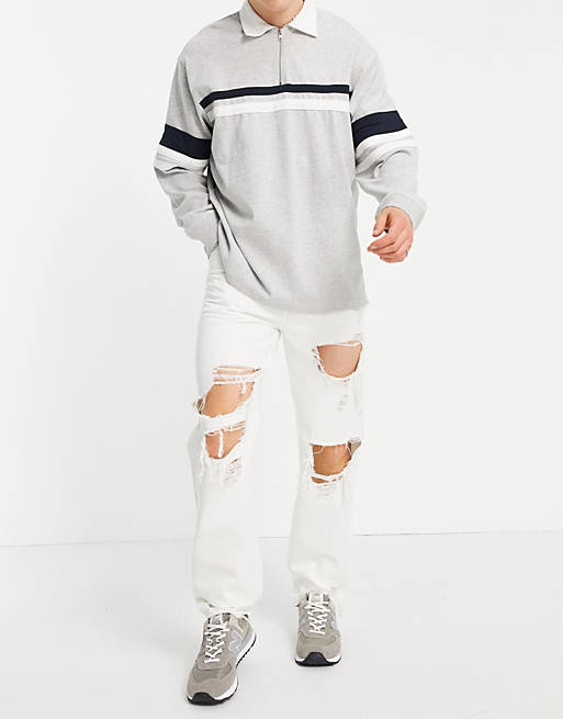 ASOS DESIGN dad fit jeans in white with heavy rips
