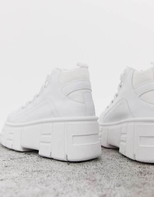 Witte sneakers best sale met dikke zool