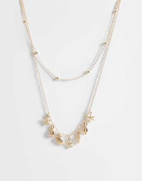ASOS DESIGN dainty 2 pack necklace with mini sea-life charms in gold tone - view 1