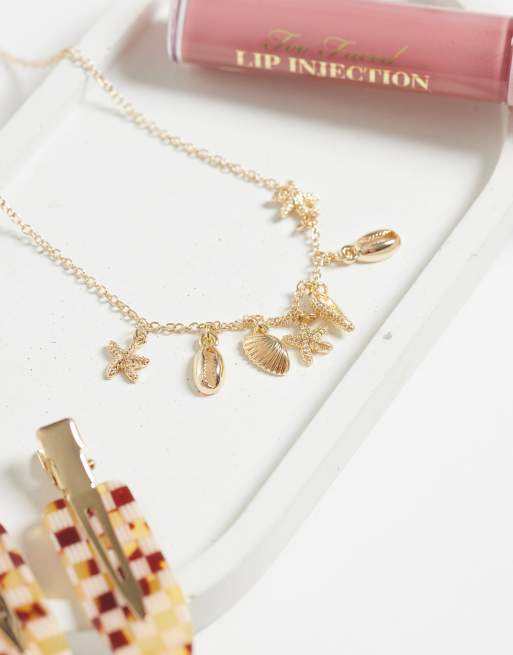 ASOS DESIGN dainty 2 pack necklace with mini sea-life charms in gold tone, 2 of 4