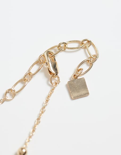 ASOS DESIGN dainty 2 pack necklace with mini sea-life charms in gold tone, 3 of 4