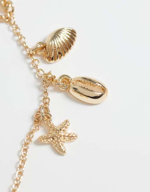 ASOS DESIGN dainty 2 pack necklace with mini sea-life charms in gold tone, 4 of 4