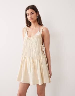 ASOS DESIGN Daisy pleated lace beach sundress in buttermilk