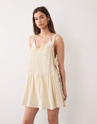 Daisy - Plissiertes Strand-Sommerkleid aus Spitze in Buttermilchgelb Gelb 34