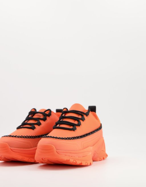 ASOS DESIGN - Danielle - Sneakers met dikke zool en ketting in oranje en zwart