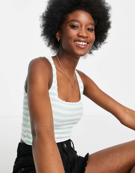 ASOS DESIGN - Débardeur à rayures avec bordure en dentelle - Vert menthe