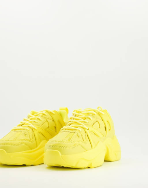 and yellow sneakers