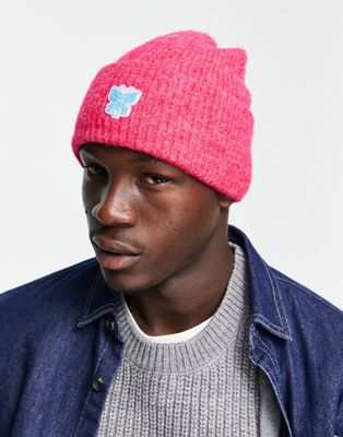 ASOS DESIGN deep turn up fluffy beanie in hot pink with rubber patch - ASOS Price Checker