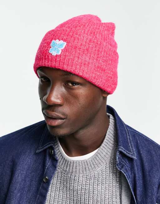 ASOS DESIGN deep turn-up fluffy beanie in hot pink with rubber patch