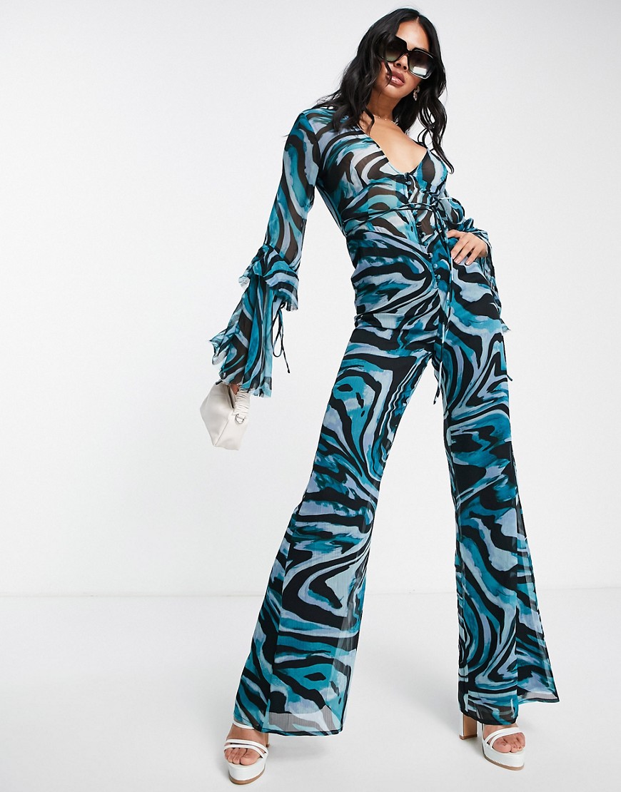 ASOS DESIGN deep v neck ruffle sleeve jumpsuit with flare leg in animal print-Multi