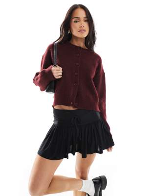 deep waistband low rise micro mini skort in black