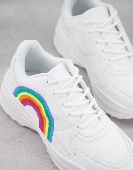 ASOS DESIGN sneakers in white with translucent blue sole