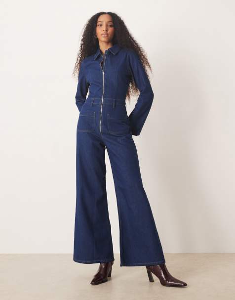 ASOS DESIGN denim 70s style flare jumpsuit in mid blue - view 1