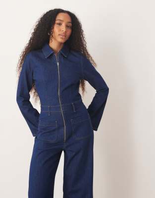 Asos Design Denim 70s Style Flared Jumpsuit In Blue