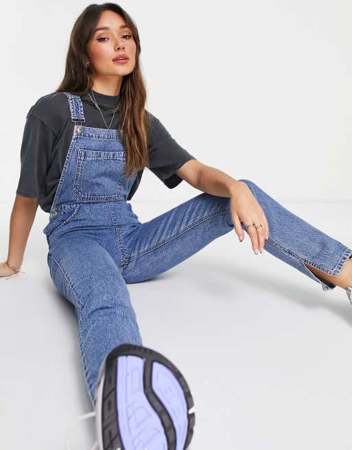 ASOS DESIGN denim 90s dungarees in rich midwash with split hem