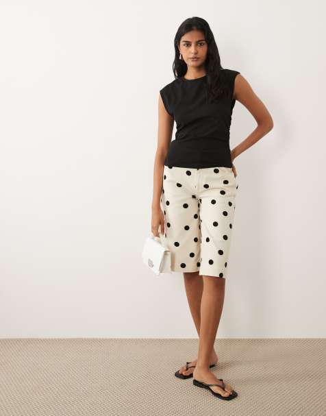 ASOS DESIGN denim bermuda shorts in cream polka dot - view 1