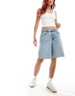 denim bermuda shorts in mid-wash blue