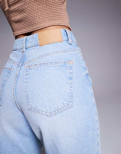 ASOS DESIGN denim bermuda shorts with rips in pale wash