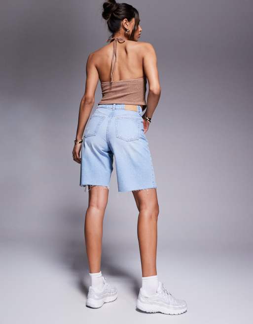 ASOS DESIGN denim bermuda shorts with rips in pale wash