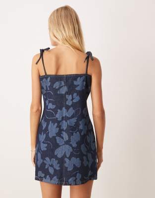 ASOS DESIGN denim cami mini dress with tie straps in floral laser indigo