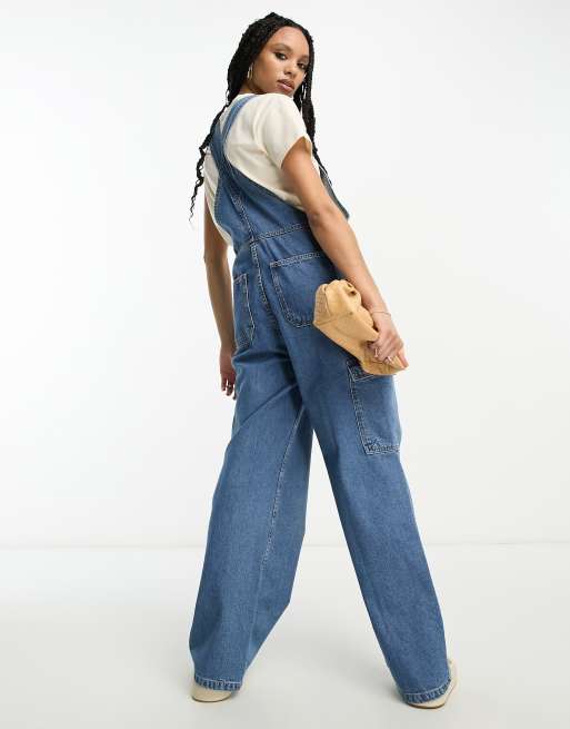 ASOS DESIGN denim cargo dungaree in mid blue