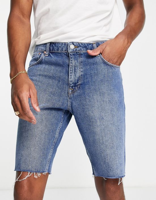 https://images.asos-media.com/products/asos-design-denim-dad-short-in-mid-wash-with-raw-hem/201622951-3?$n_550w$&wid=550&fit=constrain