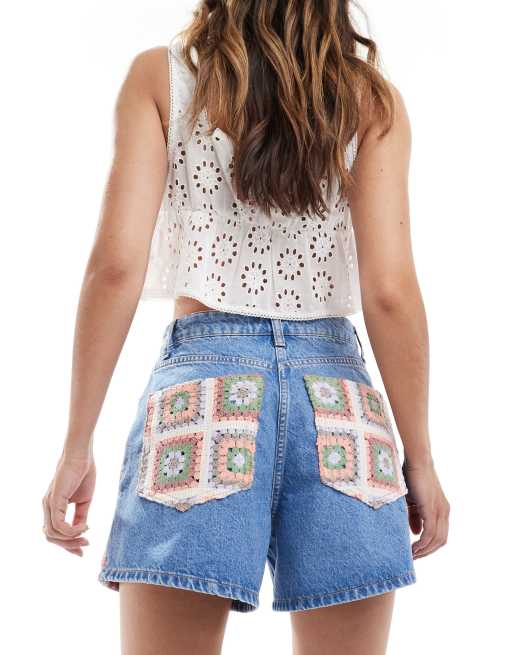 ASOS DESIGN denim dad shorts with crochet inserts in mid blue