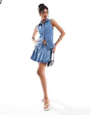 ASOS DESIGN denim fitted waistcoat and pleated mini skirt in mid blue |