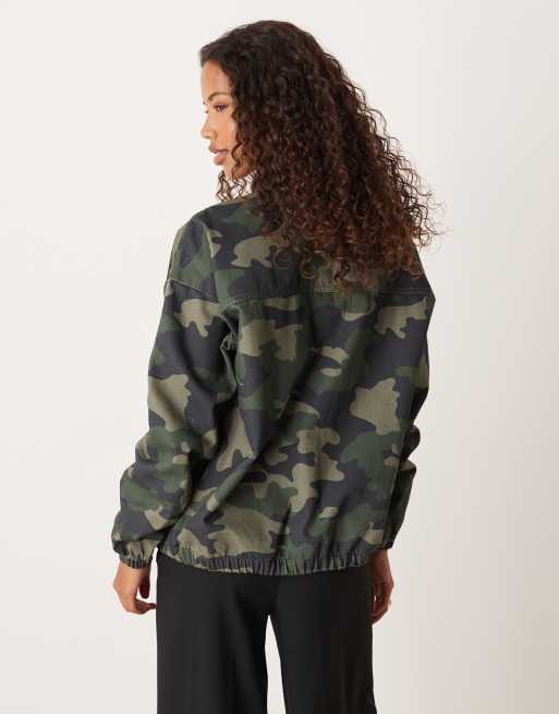 ASOS DESIGN denim funnel neck jacket in camo print