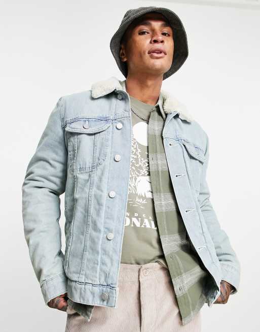 ASOS DESIGN denim jacket with borg lining in light wash