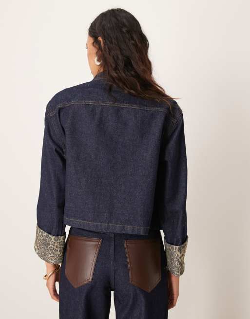 ASOS DESIGN denim jacket with leopard print turn up cuffs in
