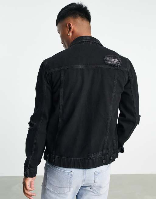 ASOS DESIGN denim jacket with rips in black