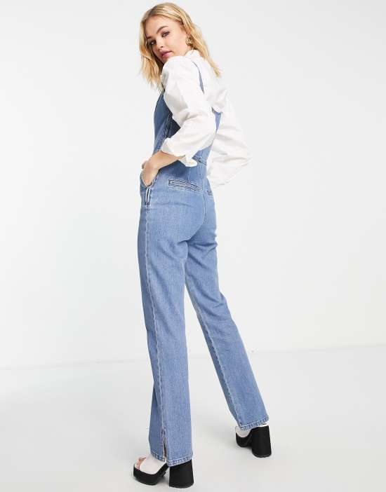 https://images.asos-media.com/products/asos-design-denim-jumpsuit-with-puddle-hem-in-midwash/201357753-2?$n_550w$&wid=550&fit=constrain