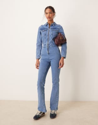 denim long sleeve jumpsuit in mid blue