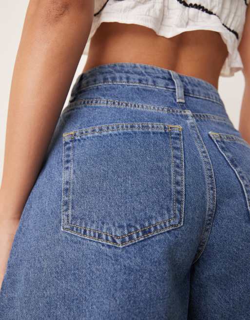 ASOS DESIGN denim longline A line shorts in mid blue
