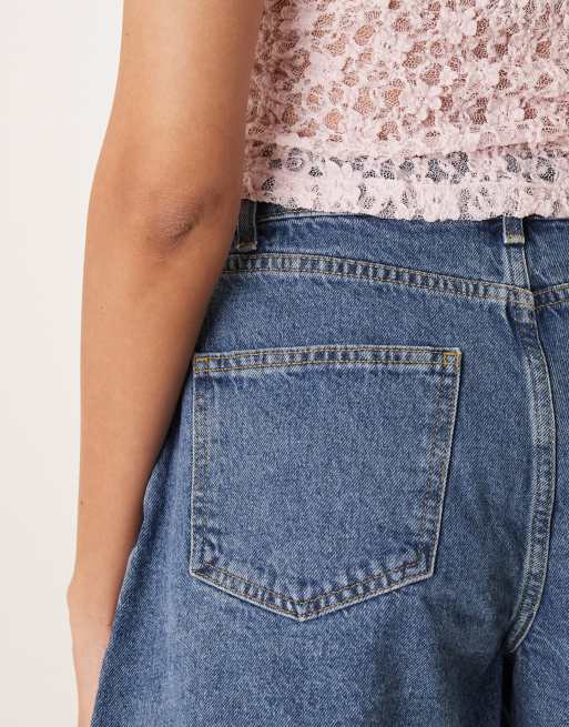 ASOS DESIGN denim longline A line short in mid blue