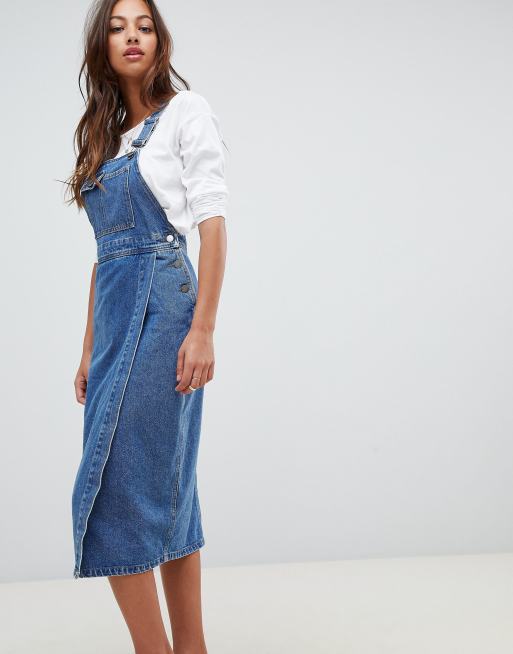 ASOS DESIGN denim midi dungaree dress in mid wash blue