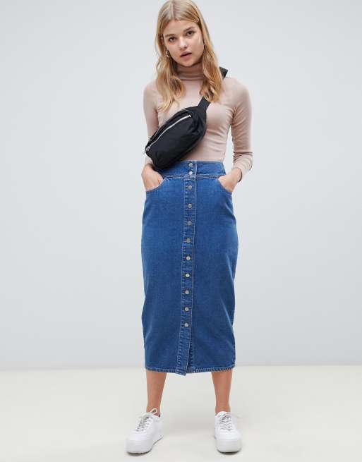 ASOS DESIGN denim midi skirt with poppers in midwash blue