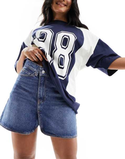 ASOS DESIGN - Denim mini rok met gekruiste taille aan de voorkant in mid-wash blauw - view 1