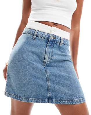 ASOS DESIGN denim mini skirt with boxer waistband in bleach wash-Blue