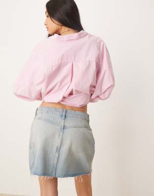 ASOS DESIGN DENIM MINI SKIRT WITH BUTTON FLY AND PATCH POCKET-BLUE 