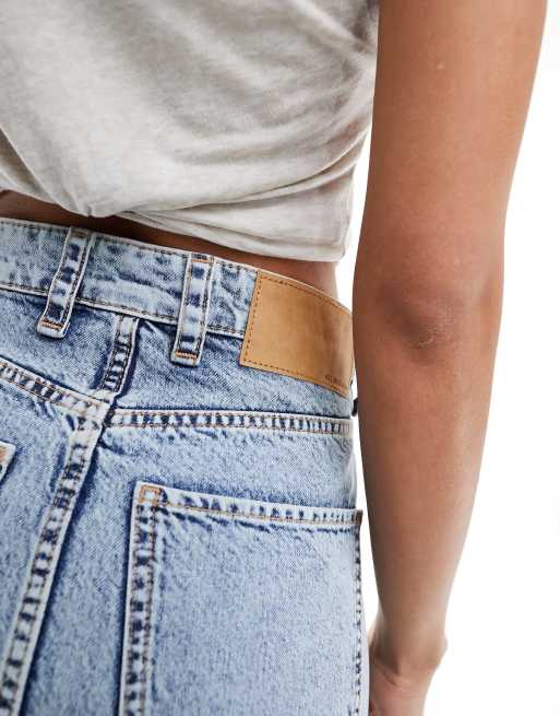ASOS DESIGN denim mini skirt with cross front waist in light wash, 2 of 5