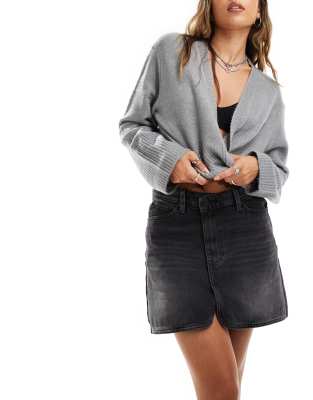 denim mini skirt with cross front waist in wash black