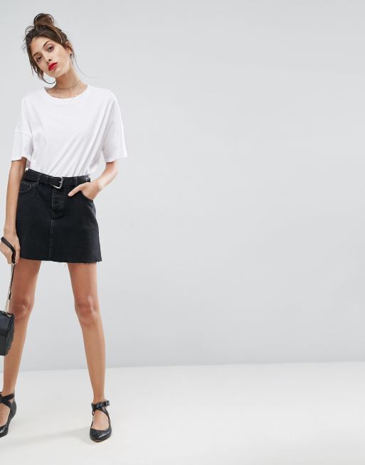 ASOS DESIGN - Denim minirok met onafgewerkte zoom in zwarte wassing