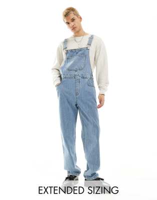 denim overalls in mid wash blue