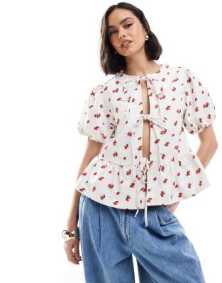 ASOS DESIGN denim puff sleeve tie front top in strawberry print-Multi