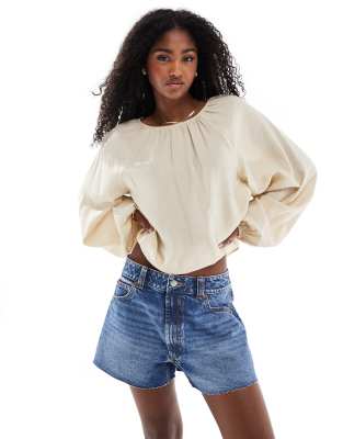 ASOS DESIGN denim relaxed shorts in midwash blue