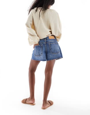 ASOS DESIGN denim relaxed short in midwash blue