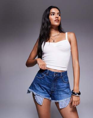 ASOS DESIGN denim ripped shorts with dropped pocket bag in dark wash-Blue