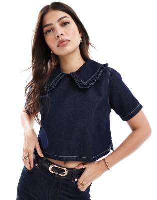 denim ruffle collar short sleeve top in indigo-Blue